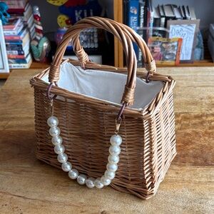 Wooden handbag with pearl strap detail